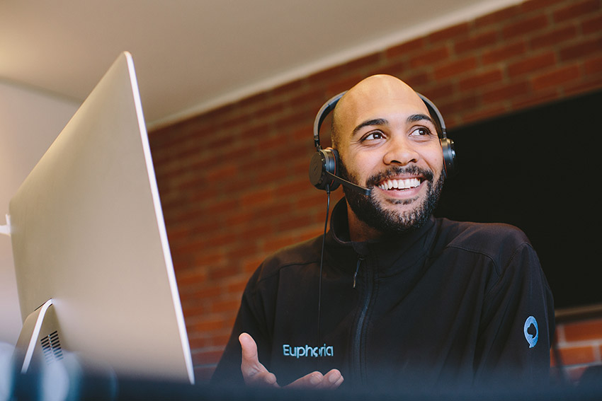 Euphoria Telecom team member smiling