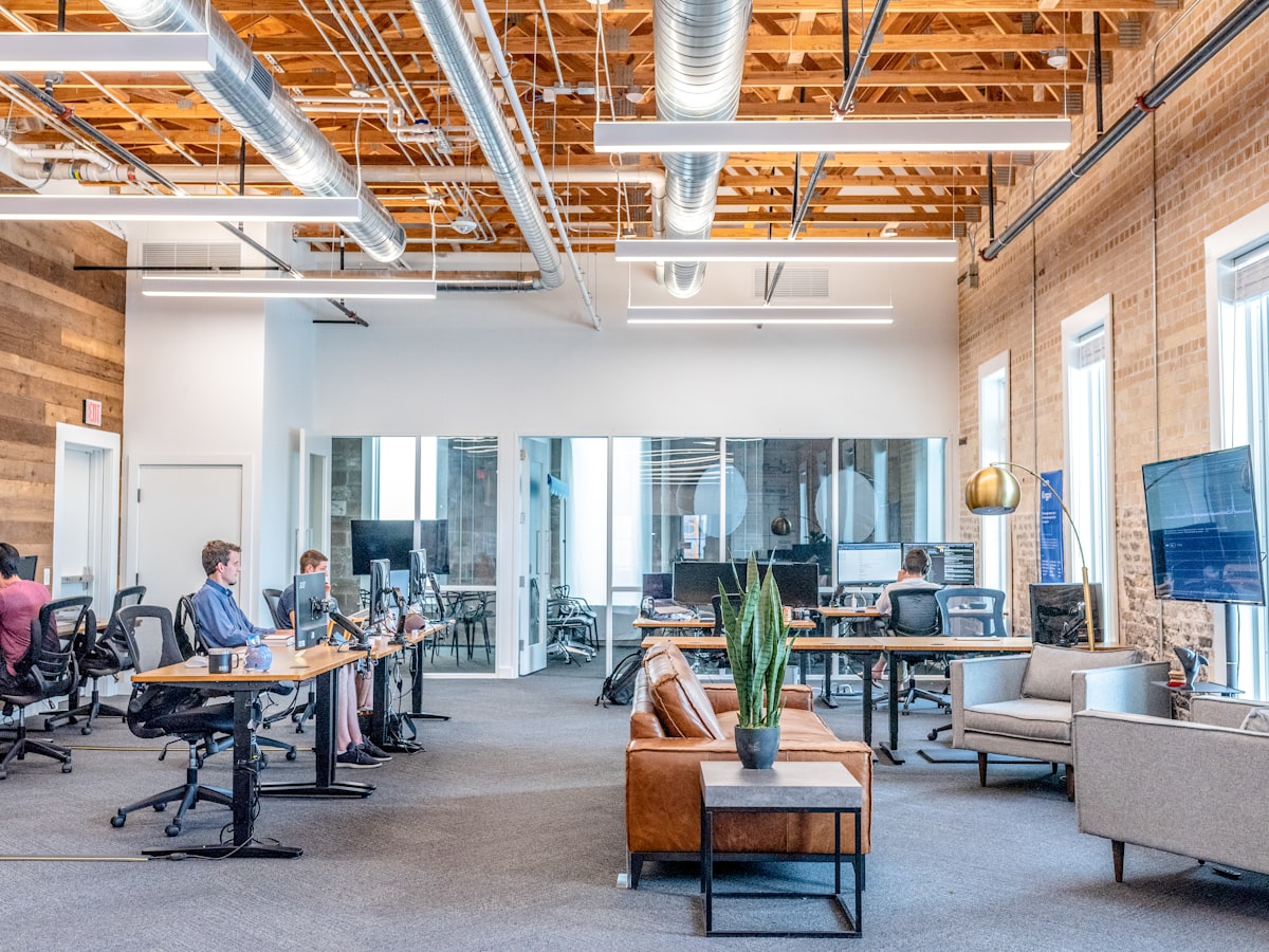 A South African small business workspace — open-plan desks, exposed brick, real teams getting work done with Euphoria